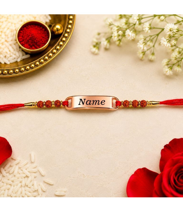 Personalised Name Rakhi For Bhabhi/Brother with Rose Gold-Plated Nameplate, Red Thread Traditional Raksha Bandhan | Best & Trendy rakhi for bhai | Customized name on Rakhi for Rakshabandhan Personalised Name Rakhi For Bhabhi/Brother with Rose Gold-Plated Nameplate, Red Thread Traditional Raksha Bandhan | Best & Trendy rakhi for bhai | Customized name on Rakhi for Rakshabandhan